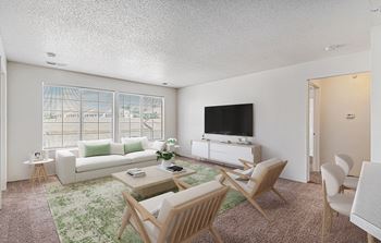 Living Room With TV at Pine Tree Apartments, Omaha, NE 68114